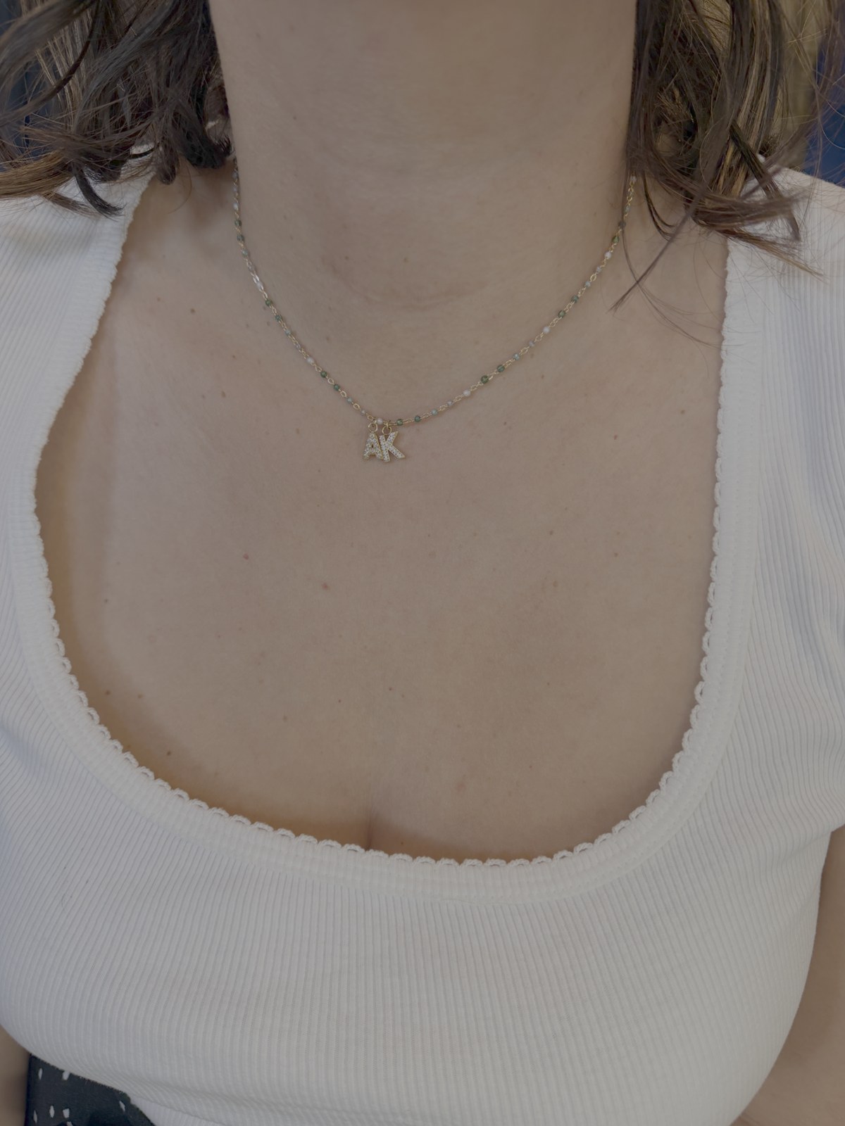 A delicate necklace with a personalized letter charm